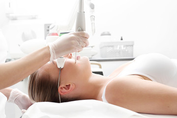 Laser therapy. Laser wrinkle removal. Smooth, rejuvenated facial skin.