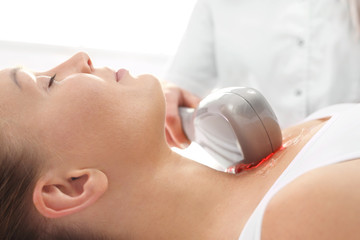 Thermolifting of the skin. A rejuvenating cosmetic care treatment in aesthetic medicine clinic.