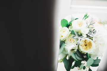 Wonderful luxury wedding bouquet of different flowers