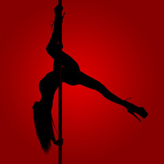 Silhouette of a slender girl while performing dance elements on a pylon. Red gradient background.
