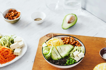 Vegetarian bowl buddha with spiralized vegetables, avocado, chickpeas and quinoa. Diet and healthy food concept