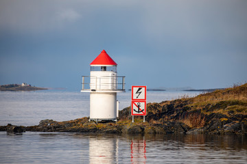 Fototapeta na wymiar Beacon on coast of Northern Norway