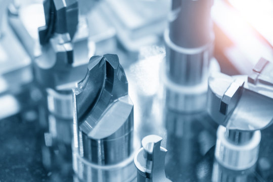 Close up of inner radius cutter tool in the light blue scene. The collection of CNC cutting tool for special function .