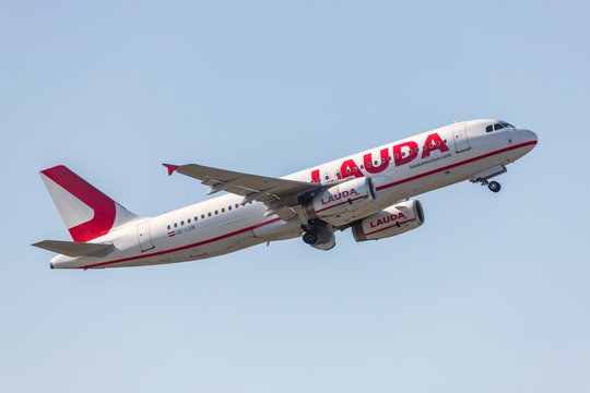 dusseldorf, nrw/germany - 20 09 19: lauda air airplane starting at dusseldorf airport germany