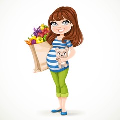 Beautiful brunette pregnant woman holding teddy bear and healthy organic products in a paper bag isolated on a white background