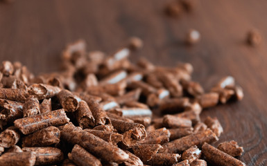 small mound of natural wood pellets with copyspace