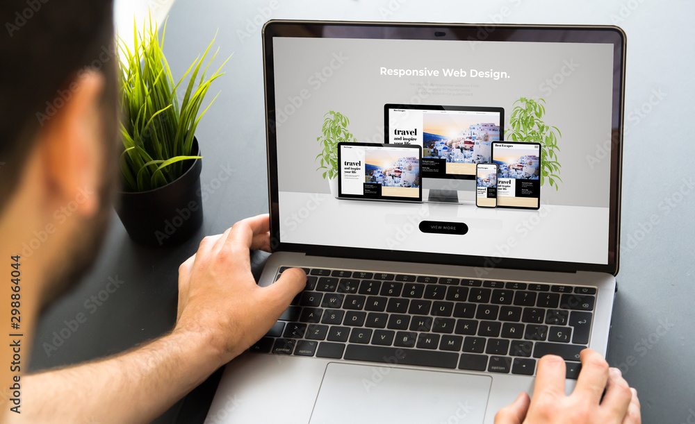 Poster man working with responsive web design screen laptop
