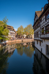 Fototapeta na wymiar Traditional half-timbered houses in La Petite France in the medieval fairytale town of Strasbourg, Alsace, France