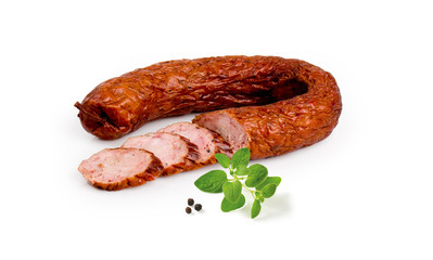 Smoked thin sausage isolated on a white background. Studio pack shot.