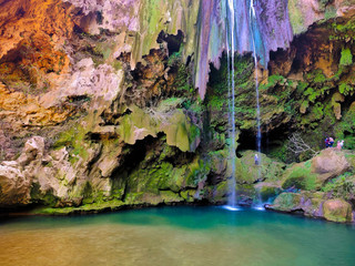 Akchour Waterfall's stunning sight located in Morocco near Chefchaouen of Morocco giving the most beautiful earthly colors which makes it a perfect background