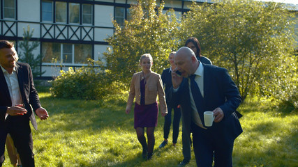 Chief goes through obstacle course in courtyard.