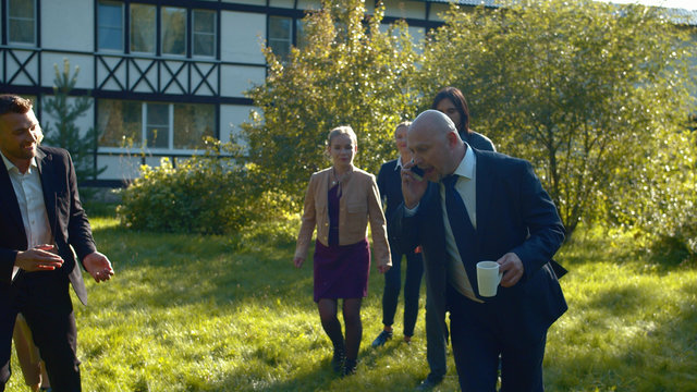 Chief goes through obstacle course in courtyard.