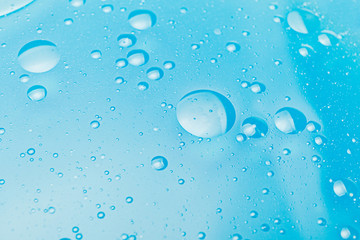 Oil bubbles in water, round abstract drops.