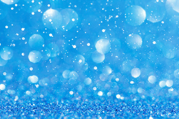 Christmas abstract blue bokeh background with lights, defocused.
