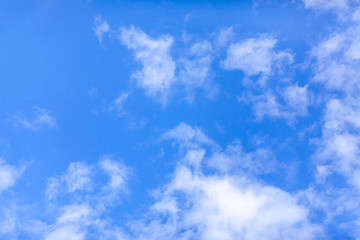 Obraz premium blue sky background with tiny clouds.