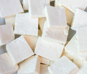 Paneer or cottage cheese cube close up.