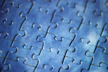 Blank puzzle with blue tint, macro