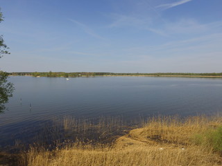landscape with lake and blue sky