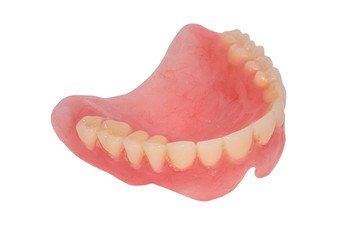 Old full removable denture. Plastic denture of the upper jaw. Dental photo Isolated on white