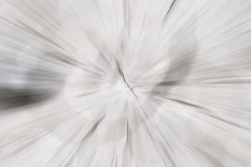 Fototapeta premium Circular geometric gray background with cracks in the center. Abstract explosion effect. Centric motion pattern