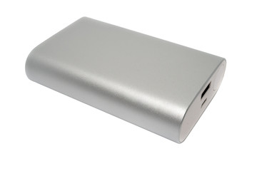 Closeup view of a rectangular silver power bank isolated on a white background. Charger for mobile phones, laptops and other electronic devices