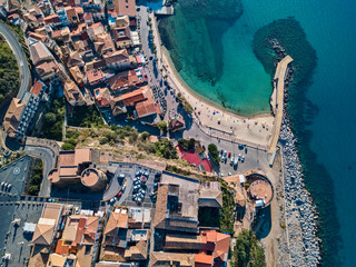 Aerial view of Pizzo Calabro, pier, castle, Calabria, tourism Italy. Panoramic view of the small town of Pizzo Calabro by the sea. Houses on the rock. On the cliff stands the Aragonese castle