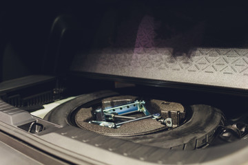 spare tire in the trunk of a modern car.