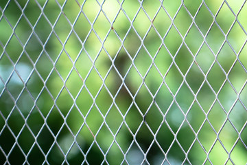 Fototapeta premium Chain link from realistic steel on green background.