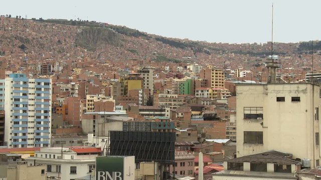 Poor hill suburbs and city center view from downtown La Paz, Bolivia