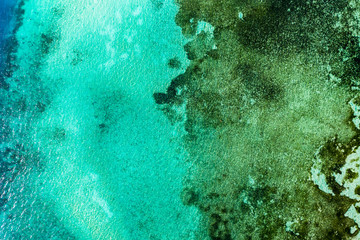Fototapeta na wymiar Aerial view, lagoon of a Maldives island with corals from above, South Male Atoll, Maldives