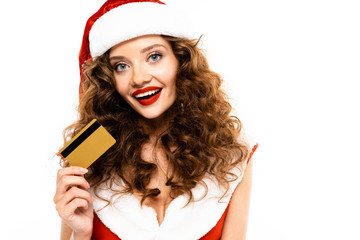 smiling woman in santa costume holding credit card, isolated on white