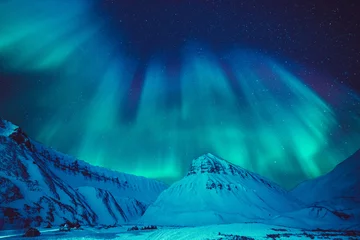 Foto op Aluminium The polar arctic Northern lights hunting aurora borealis sky star in Norway travel photographer  Svalbard in Longyearbyen city the moon mountains © bublik_polina