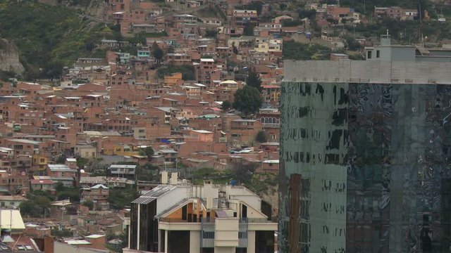 Poor suburbs view with skyscraper from downtown La Paz, Bolivia