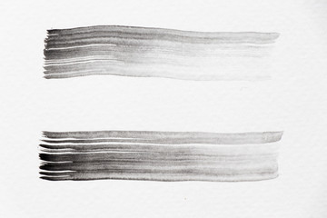 Black color watercolor handdrawing as line brush on white paper background