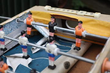 Old abandoned retro vintage football table game. Childhood memories. Antique finds on flee market.