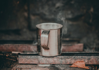 cup of coffee on wooden table