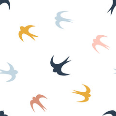 Obraz premium Seamless pattern with colorfull silhouettes of swallows on white. Vector illustration.