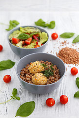 chicken meatballs with buckwheat and greens