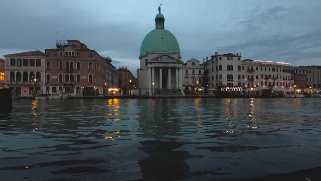 view of san simeone piccolo church and grand canal at evening time
