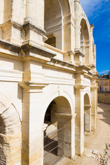 The Arles Amphitheatre in southern France in a sunny late summer day