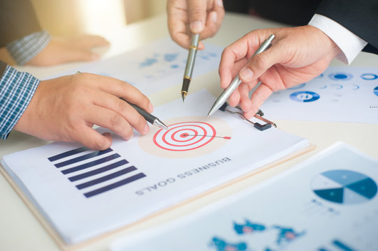 Close up concepts about goals or objectives of teamwork. Business team planning for business goals.