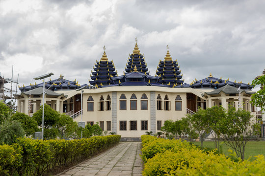  Imphal city, Manipur state, India. ISKCON Temple surrounded by green and yellow plants. stunning view and angle