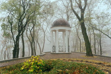 Obraz premium White arbor in the fog in the fall. Gomel, Belarus