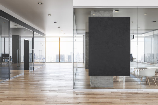 Modern concrete office interior with black poster