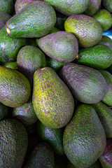 Fresh organic avocados at a local market in Ibarra, Ecuador.  Nutritious healthy fruit. 