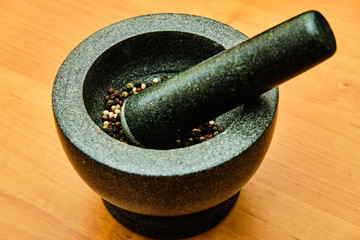 4 colour pepper in mortar and pestle