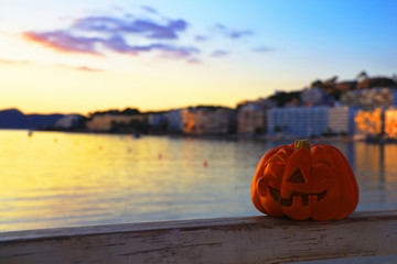 Halloween pumpkin on a background of the sea