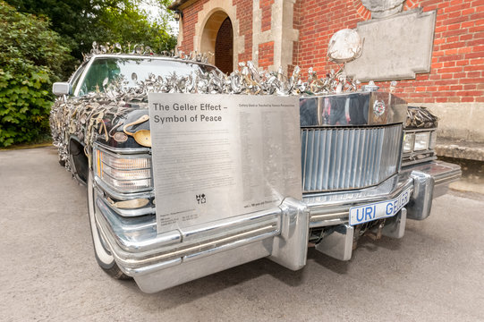 Uri Geller Cadillac art car, decorated with 5000 pieces of cutlery contorted by mind bending in Winnersh, UK - May 18, 2013