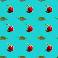 Seamless background with hot red pepper round with green leaf on bright blue background. Modern style isometric concept.