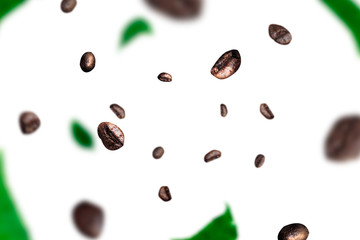 Grains of coffee and leafs levitation